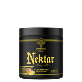 A black container of Ambrosia Nektar superfood supplement with gold and green label design, featuring an image of a green and yellow fruit on the label.