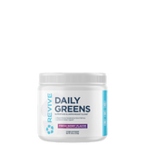 A container of Revive Daily Greens powder with a label indicating 'Fresh Berry Flavor'.