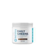 A container of Revive Daily Greens powder with a label indicating 'Chocolate Flavor'.