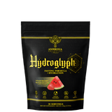A black package of Hydroglyph fasting formula by Ambrosia Collective, with gold and green text, and an illustration of fruits and leaves.