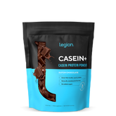 A sealed pouch of Legion Casein+ Casein Protein Powder, with a chocolate flavor illustration and no artificial sweeteners or flavors text on the package.