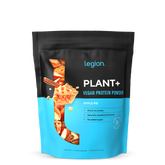 A sealed pouch of Legion Plant+ Vegan Protein Powder, Apple Pie flavor. The packaging is predominantly black and blue with an image of an apple pie and pieces of apples.