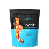 A sealed pouch of Legion Plant+ Vegan Protein Powder, Apple Pie flavor. The packaging is predominantly black and blue with an image of an apple pie and pieces of apples.