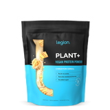 A sealed pouch of Legion Plant+ Vegan Protein Powder, Cinnamon Cereal flavor. The packaging is predominantly black and blue.