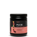 A container of Legion Pulse Stim-Free Pre-Workout Supplement with blue raspberry flavor, showing the brand logo and product information on the label.