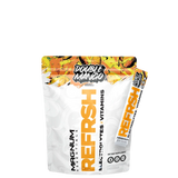 A sealed pouch of Magnum Essentials REFRSH Electrolytes x Vitamins with watermelon flavor, predominantly white with pink and green accents, and text detailing the product's benefits.