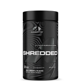 A container of Alchemy Labs Shredded dietary supplement, with a black and white design featuring the brand logo and product name.