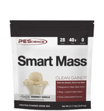 Smart Mass tub next to scoop and shaker bottle