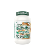 A container of ProtoLyte Plant Based Protein powder with the label visible, indicating it is a natural protein supplement with electrolytes and enzymes, zero sugar and dairy, gluten free.