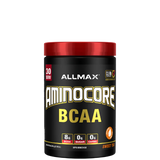 A container of Aminocore BCAA Supplement Powder by ALLMAX in black color with red and pink text, indicating the flavor as Pink Lemonade.