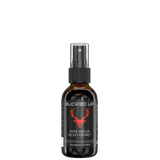 A bottle of Deer Antler Velvet Extract Spray with a spray nozzle, branded 'BUCKED UP' with a red deer logo
