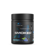Smoked bottle placed beside workout gear and water