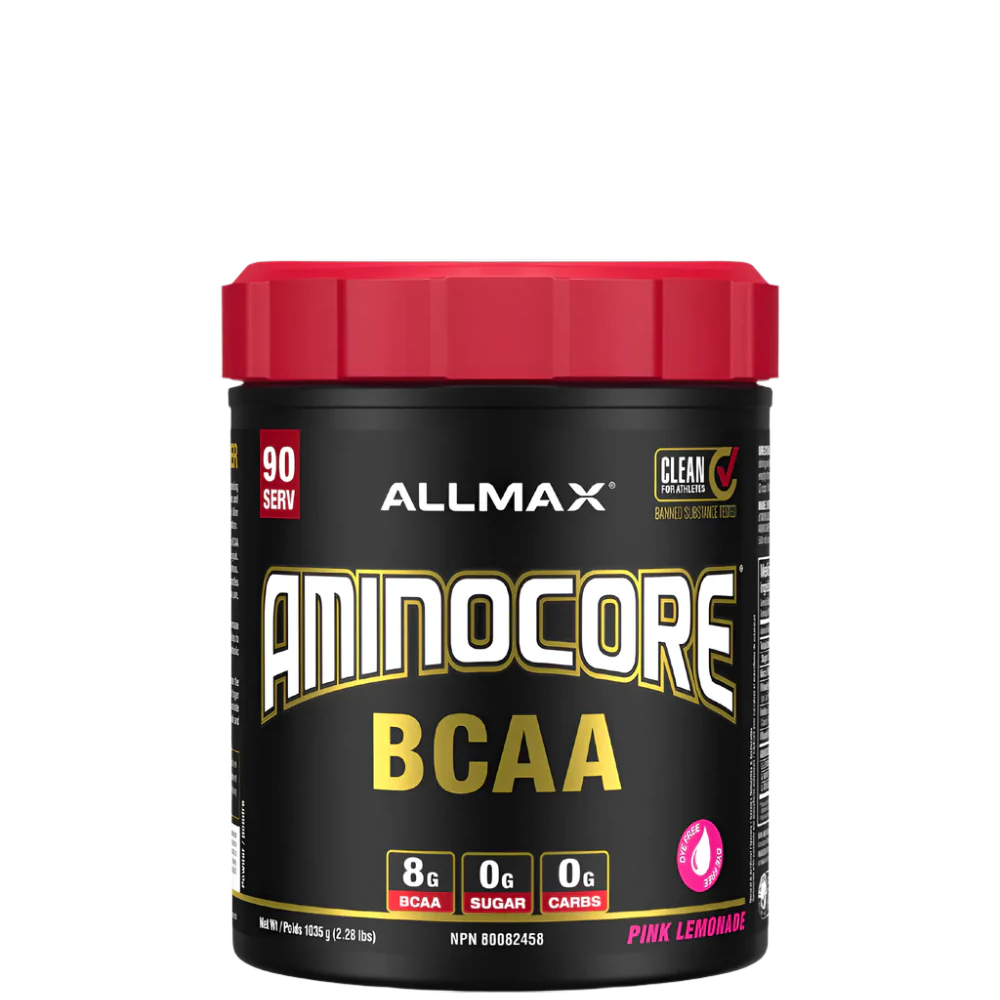 A container of Aminocore BCAA Supplement Powder by ALLMAX in black color with red and pink text, indicating the flavor as Pink Lemonade.