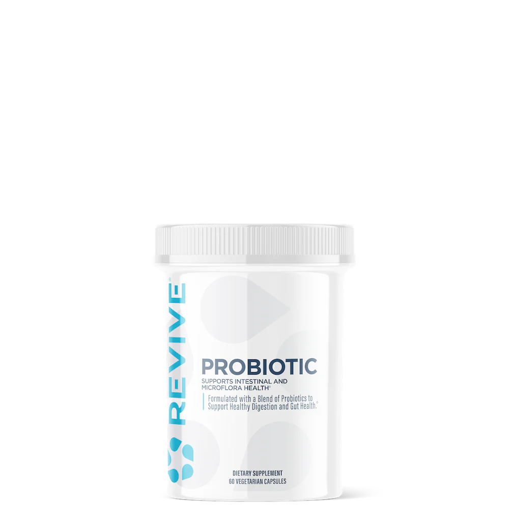 A white bottle labeled 'Probiotic' by Revive, indicating a supplement for digestive health and immune support.